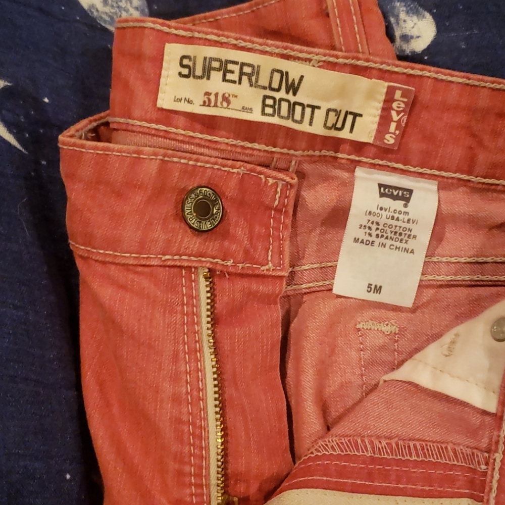 Pink Levi 318 superlow bootcut